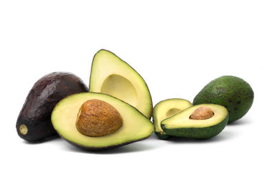 Close-up of fruits against white background