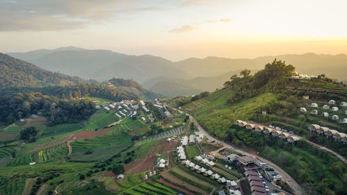 High angle view of trees on field against sky