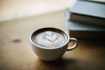 High angle view of coffee cup on table