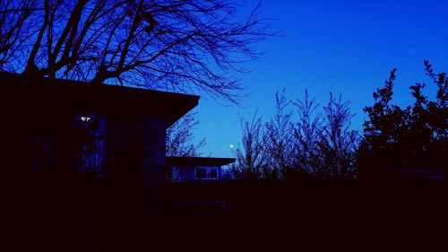 Low angle view of built structure against blue sky