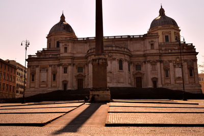 Facade of historic building against sky