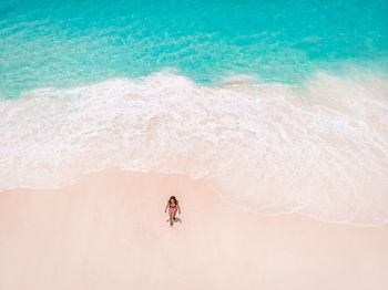 High angle view of person on beach, seychelles tropical island 