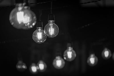 Close-up of illuminated light bulb