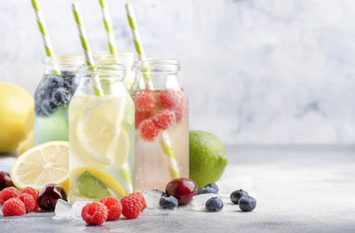 Close-up of fruits in glass container