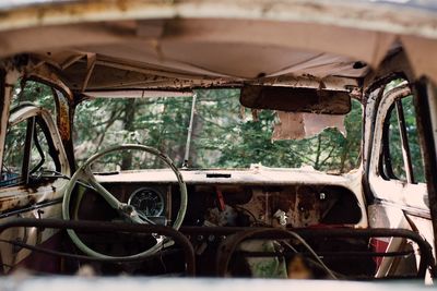 Close-up of abandoned car