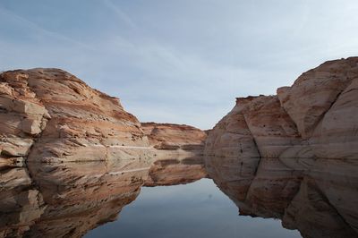 View of rock formations against sky