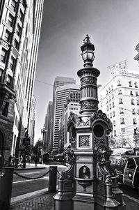 City street and modern buildings against sky