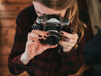 Midsection of man photographing