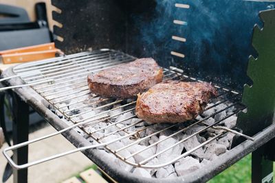 Close-up of meat on barbecue grill