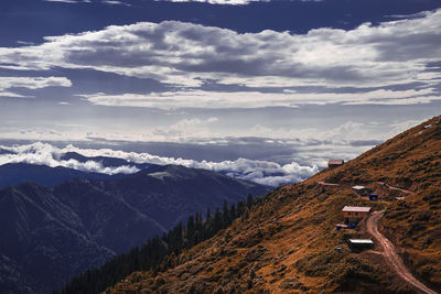 Scenic view of snowcapped mountains against sky