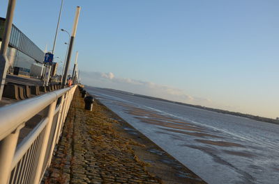 Scenic view of beach against clear sky