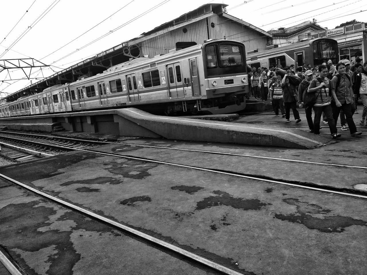 RAILROAD STATION PLATFORM AGAINST SKY