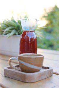 Close-up of drink in glass jar on table