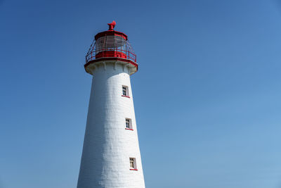 Low angle view of lighthouse against sky