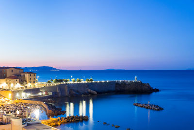 Beautiful view of piazza bovio at sunrise, piombino, tuscany, italy