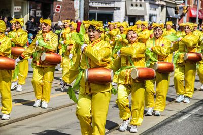 Group of people walking on street