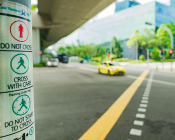 Road sign on street in city