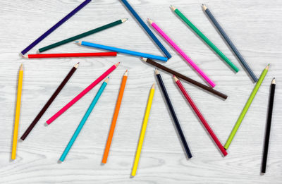 High angle view of multi colored pencils on table