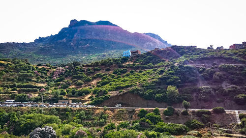 Scenic view of land against clear sky