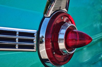 Close-up of coin-operated binoculars by swimming pool