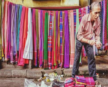 Full length of woman working at market