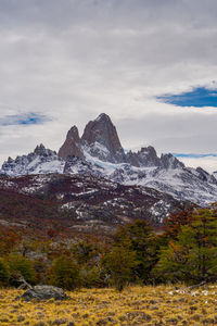 Scenic view of snowcapped mountains against sky