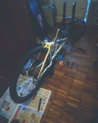 High angle view of bicycles on wooden floor at home