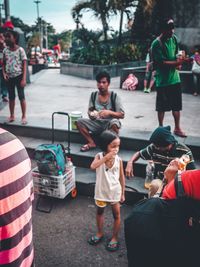 Full length of people on street in city