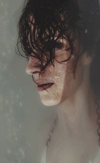 Close-up portrait of woman in the water