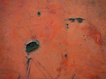 Full frame shot of peeled orange wall