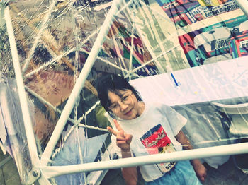 High angle view of girl holding umbrella
