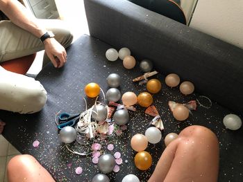 Low section of woman sitting on floor