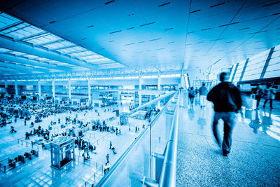 People walking in modern office building