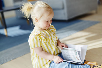 Happy girl with book