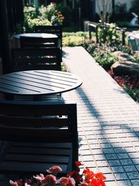 Table and chairs on footpath