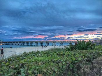 Scenic view of sea against cloudy sky