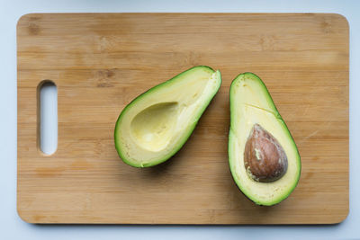 High angle view of fruits on cutting board