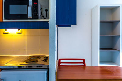 Empty chairs and table at home
