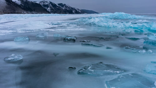 Aerial view of frozen lake against sky