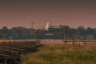 Built structure against clear sky at sunset