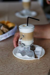 Close-up of coffee cup on table