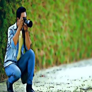 Full length of woman photographing