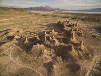 Trona pillars casting long shadows from above