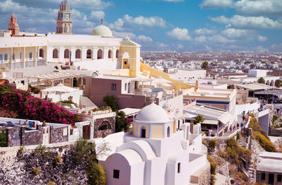 Panoramic view of city buildings against sky