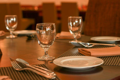 Wine glasses on table in restaurant