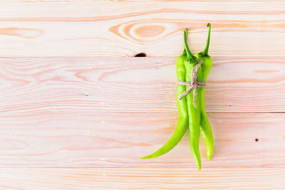 High angle view of green chili pepper on table