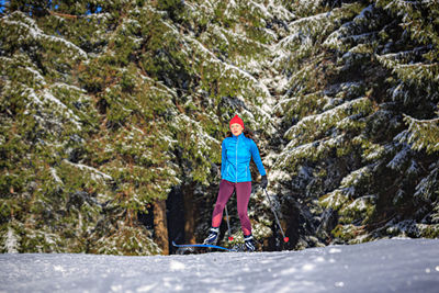 Full length of child on snowy field