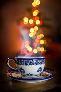 Close-up of coffee cup on table