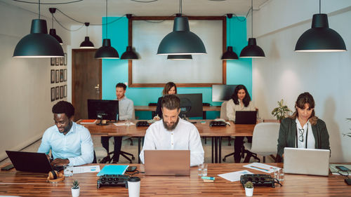 Business colleagues working at office