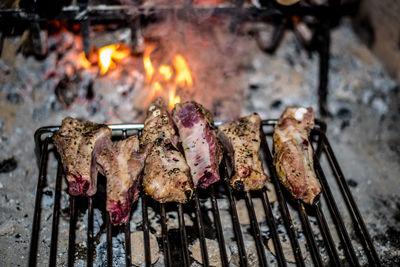 Close-up of meat on barbecue grill